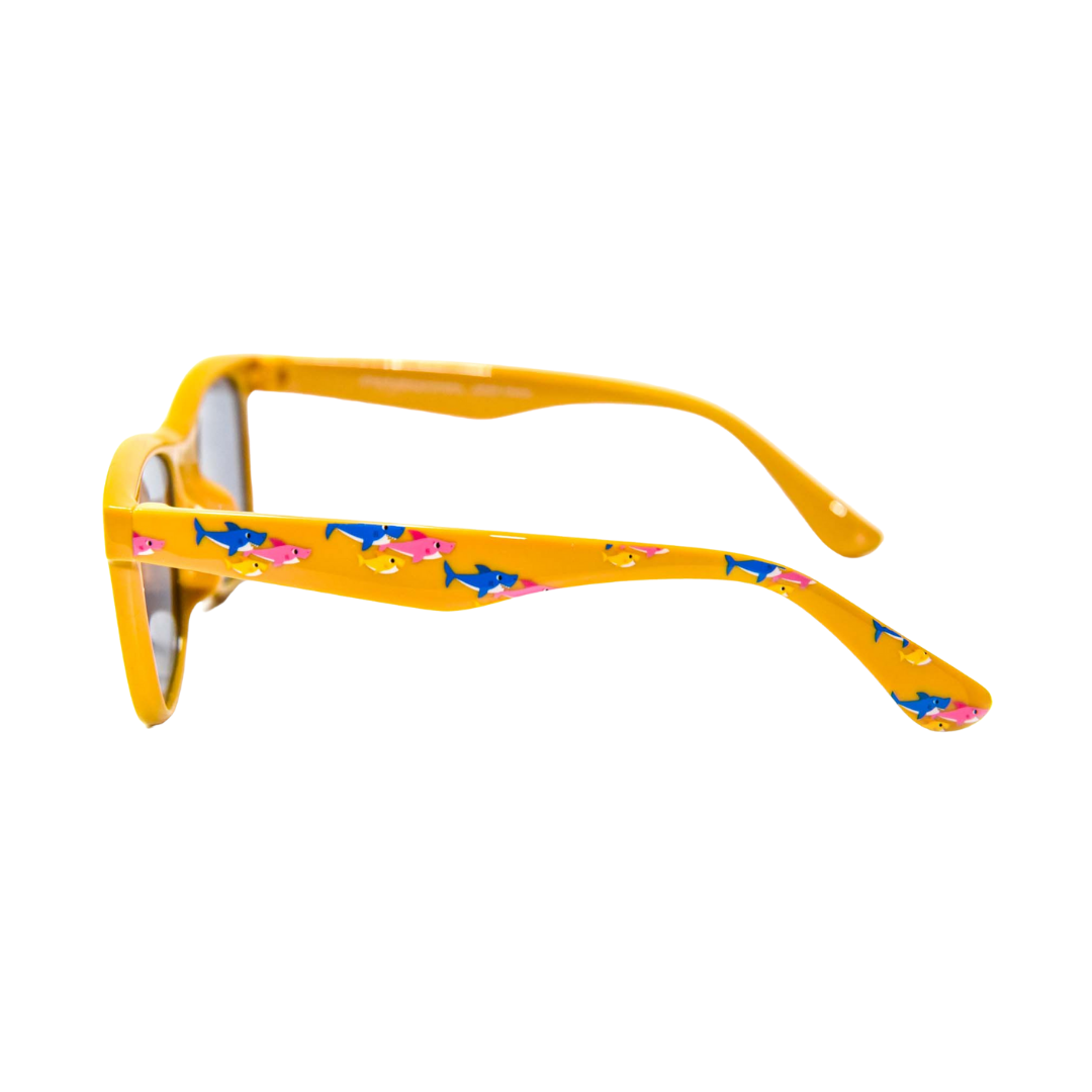 Side view of the bright yellow Baby Shark sunglasses, perfect for children seeking vibrant sun protection.