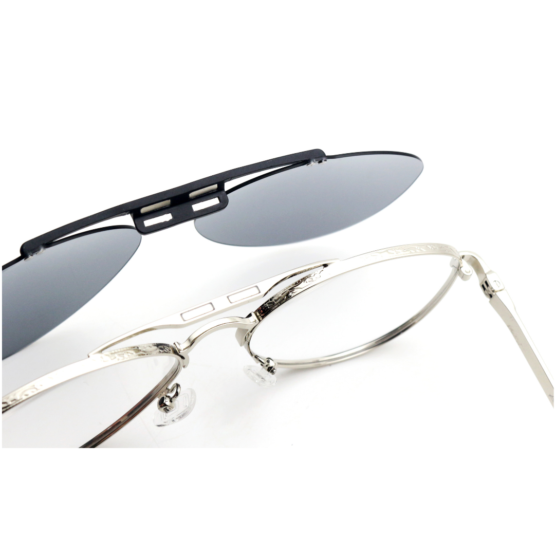 Two pairs of sunglasses, one with black frames and reflective lenses, the other with silver frames and clear lenses, on a white background.