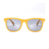 Bright yellow Baby Shark sunglasses for kids, offering cheerful style and sun protection.