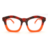 Bold orange optical frames from the Kente collection for adults, a vibrant statement in eyewear.