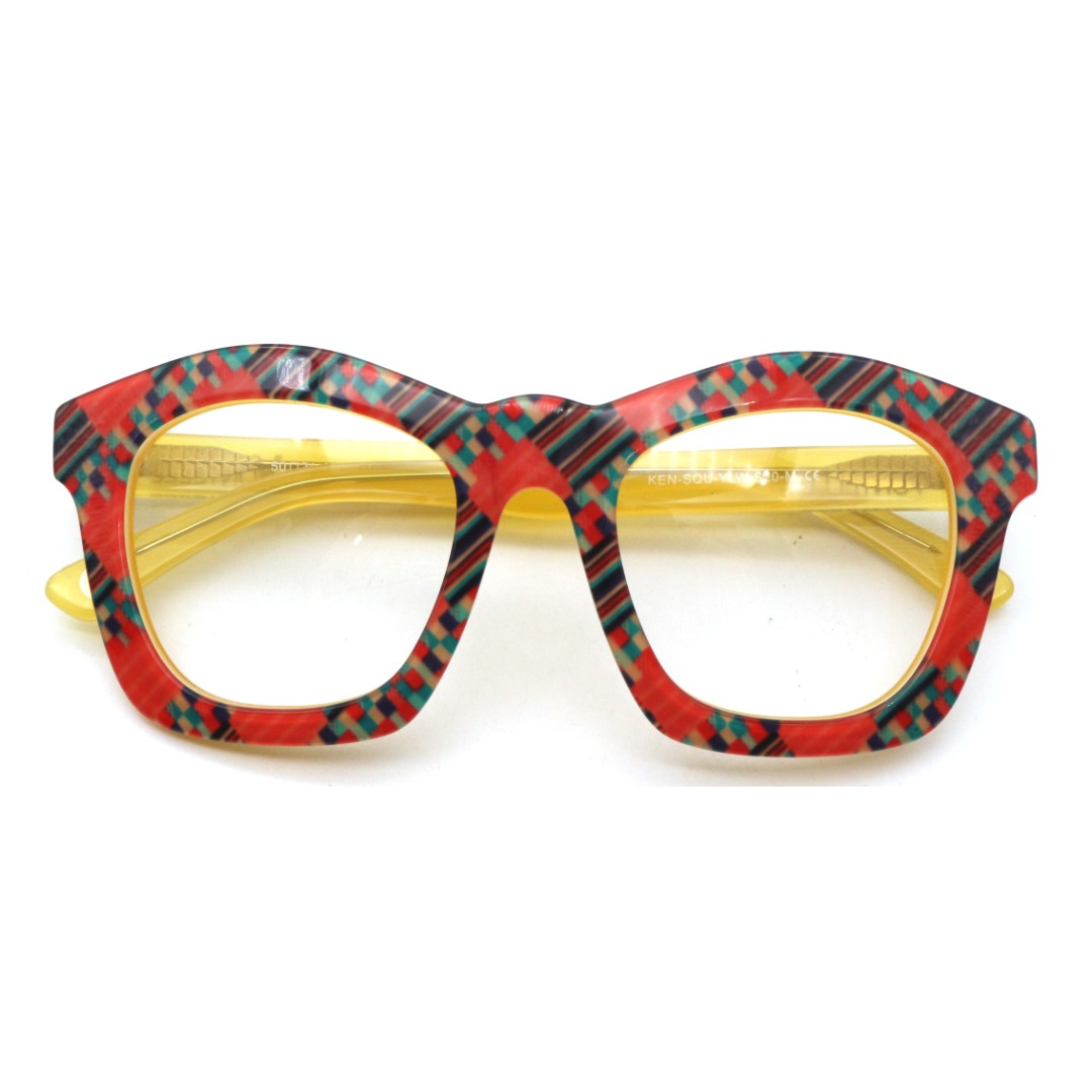Front view of the sunny yellow Kente optical frames for adults, highlighting their warm and inviting design.